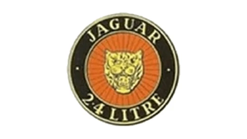 Jaguar Growler badge, the round emblem with a snarling jaguar face on red